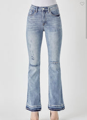 Mid Rise Distressed Shadow Hem Flare Jeans