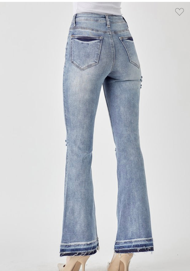 Mid Rise Distressed Shadow Hem Flare Jeans