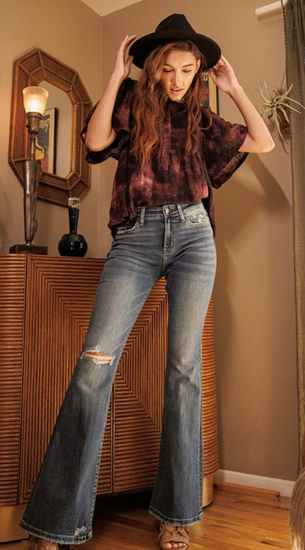 Mid Rise Flare Jeans With Distressing