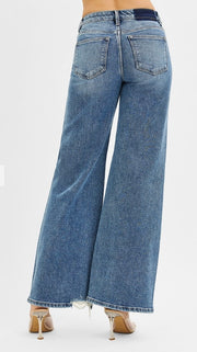 Mid Rise Wide Leg Tummy Control Jeans With Distressing