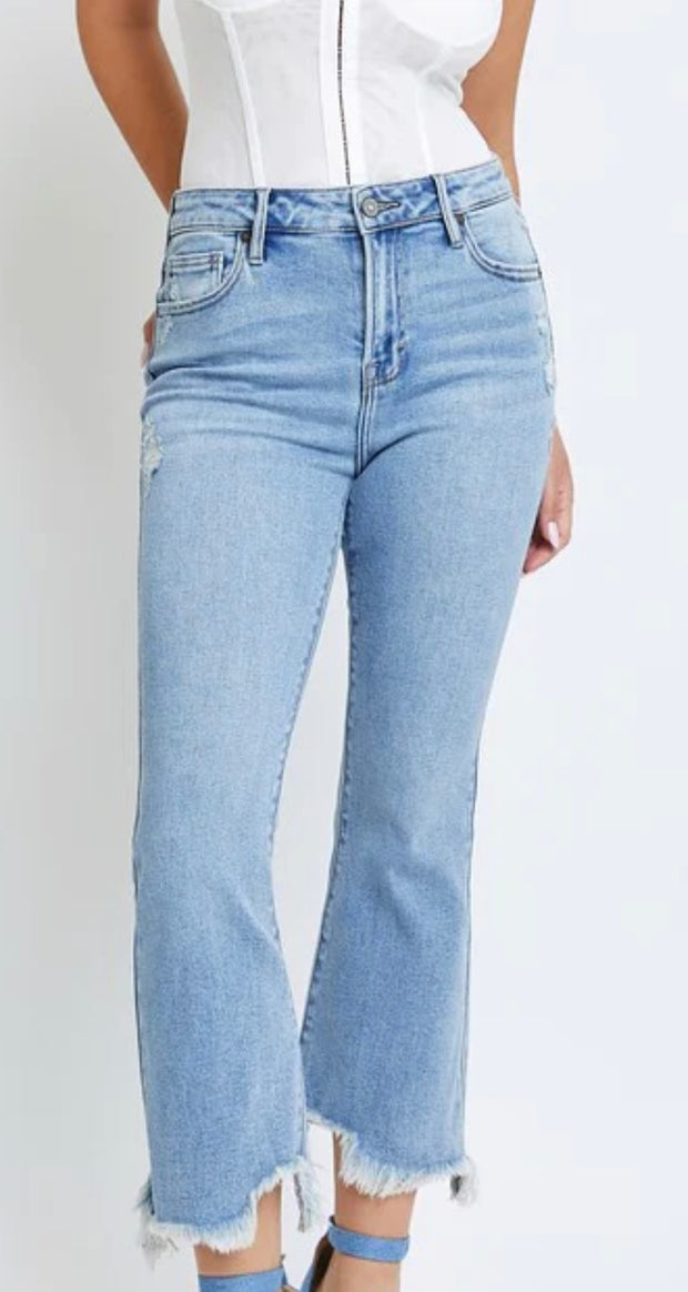 Cropped Flare Chewed Hem Jeans With Slight Distressing