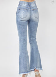 Risen Light Wash Raw Hem Distressed Flare Jeans With Back Detail